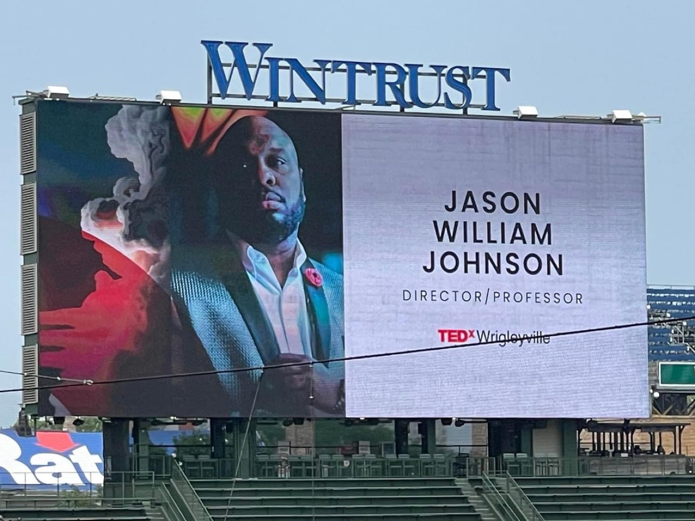 Jason William Johnson featured on the Wrigley Field jumbotron for TEDx Wrigleyville